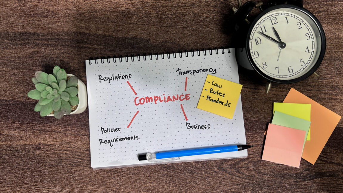 vecteezy_concept-of-compliance-write-on-book-with-keywords-isolated_51803139-scaled.jpg